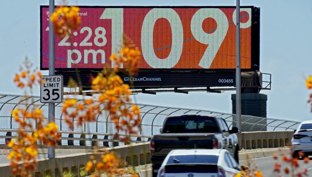 A digital billboard displays an unofficial temperature, July 17, 2023, in Phoenix. Cities across the United States and around the world are grappling with ways to protect people from extreme heat as global temperatures rise each year. (AP)