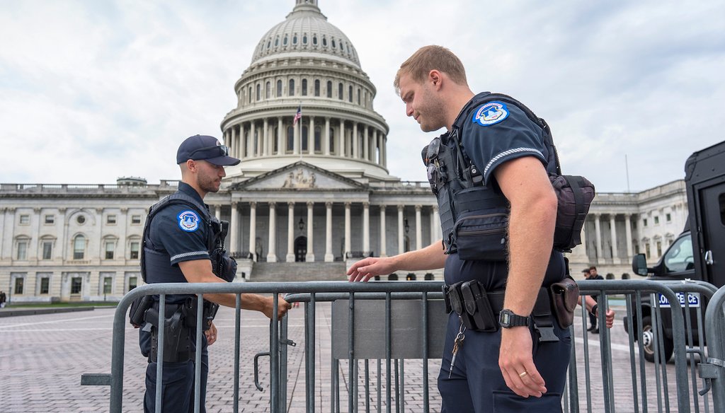 Capitol Police officers adjust security barriers around the East Plaza at the Capitol in Washington, Sept. 24, 2025. (AP)