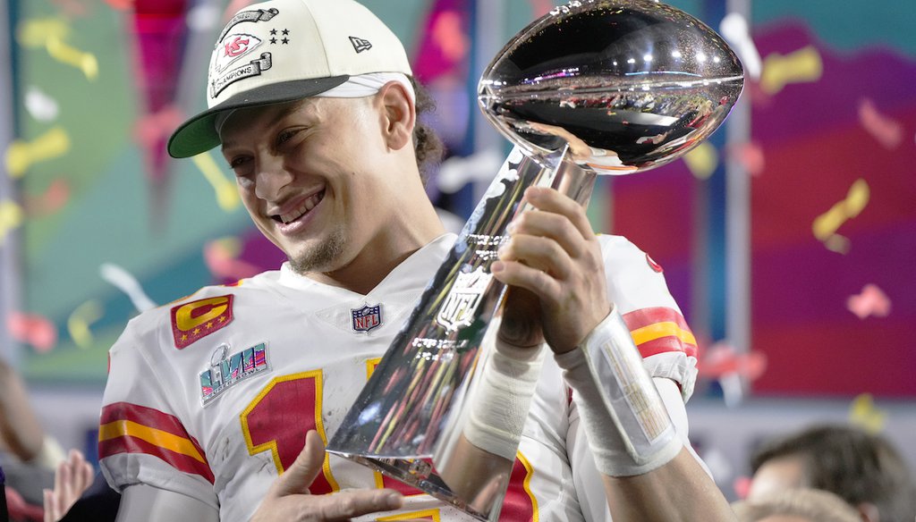 Kansas City Chiefs quarterback Patrick Mahomes (15) holds the trophy after their win against the Philadelphia Eagles in the NFL Super Bowl 57 football game, Sunday, Feb. 12, 2023, in Glendale, Ariz. (AP)