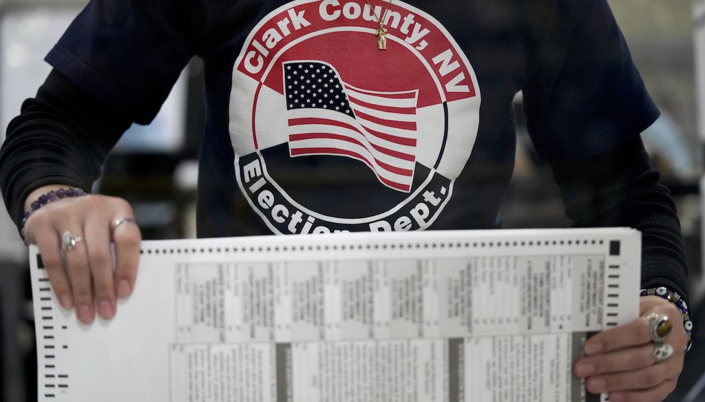 An election worker tabulates mail-in ballots at the Clark County Election Department Wednesday, Nov. 9, 2022, in Las Vegas. (AP)