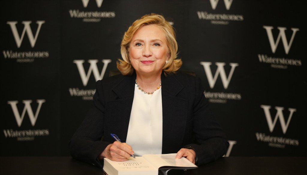 Hillary Clinton signs copies of her new book on July 3, 2014 in London, England.