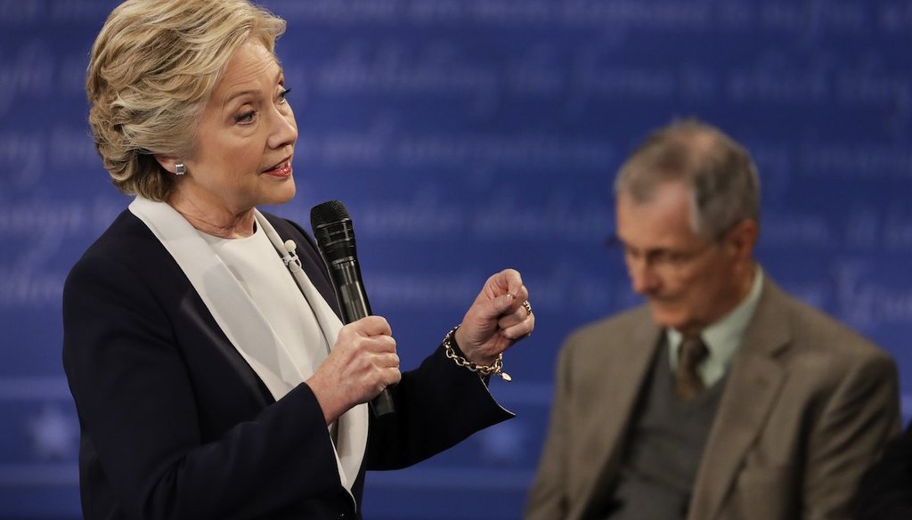 Democratic presidential nominee Hillary Clinton answers a question during the second presidential debate at Washington University in St. Louis, Sunday, Oct. 9, 2016. (AP Photo/Julio Cortez)