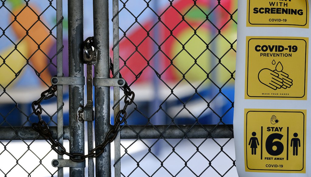In this July 13, 2020, file photo, a gate is locked at the closed Ranchito Elementary School in the San Fernando Valley section of Los Angeles. (AP)