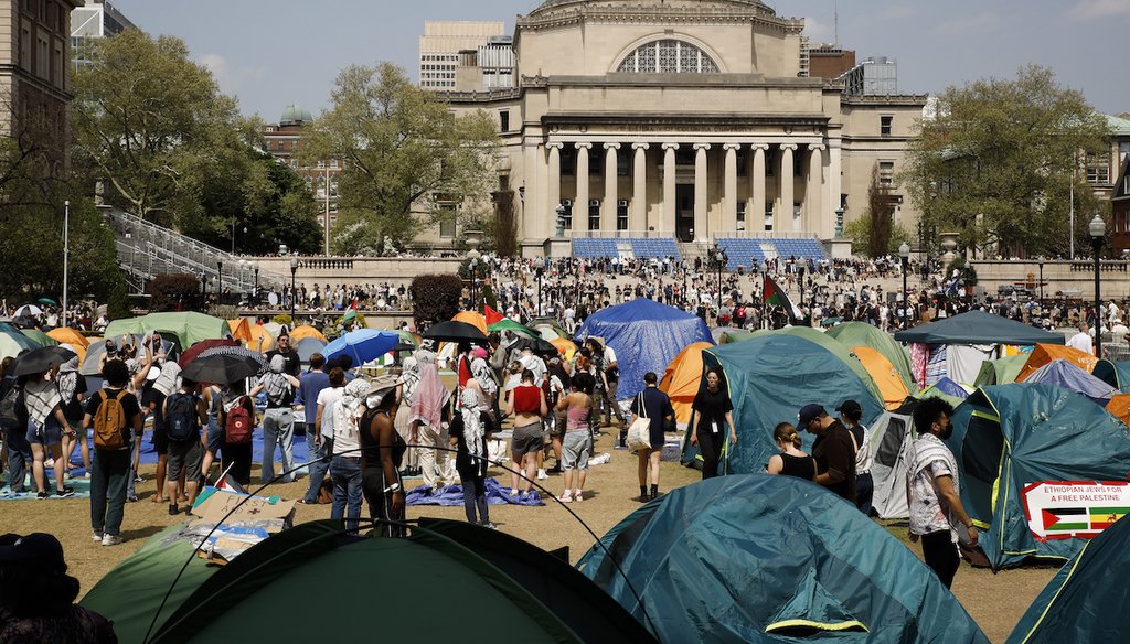 Student protesters gather inside their encampment on the Columbia University campus on April 29, 2024, in New York. (AP)