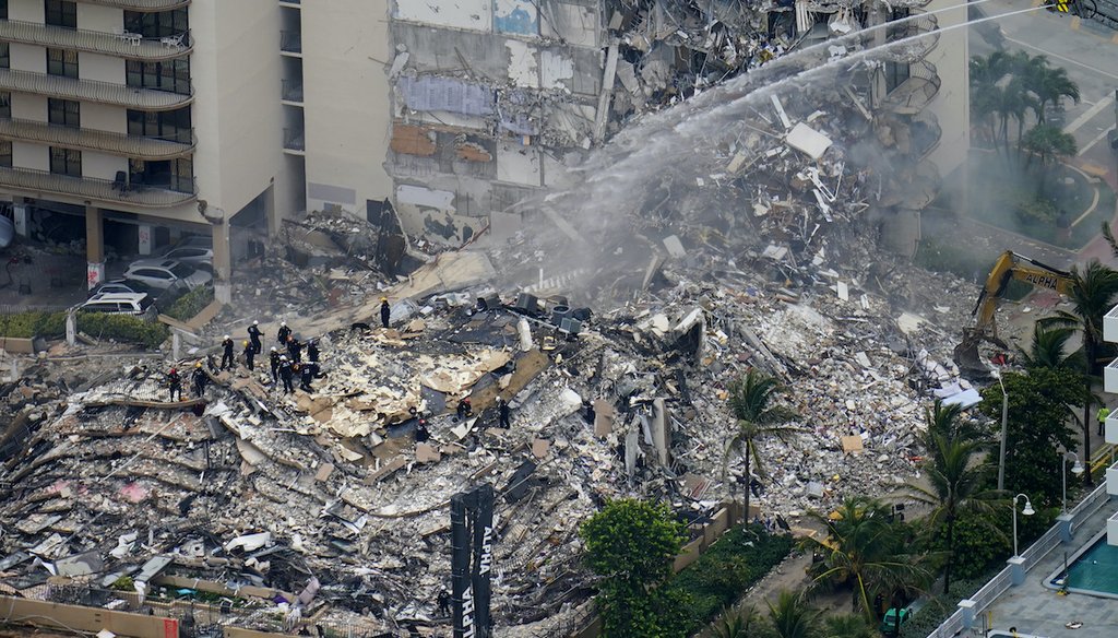 Rescue workers work in the rubble at the Champlain Towers South in Surfside, Fla. on June 25, 2021 (AP)