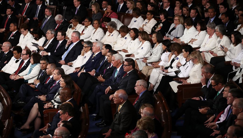 Democratic members of Congress wear white for U.S. President Donald Trump's address to a joint session of the U.S. Congress on February 28, 2017. (Getty)