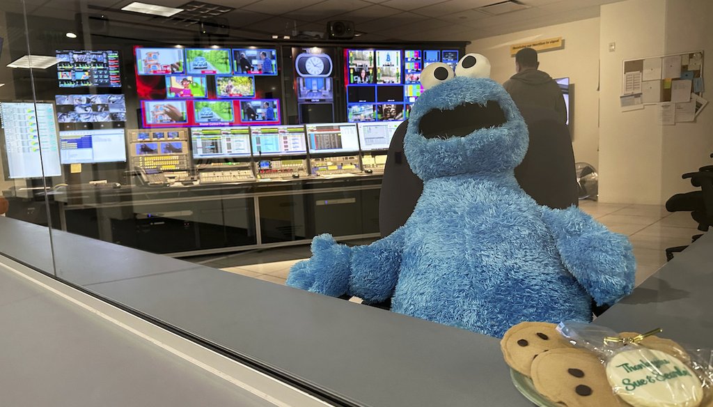 A stuffed Cookie Monster is seated in a control room at the Arizona PBS offices at the Walter Cronkite School of Journalism and Mass Communication in Phoenix, May 2, 2025. (AP)