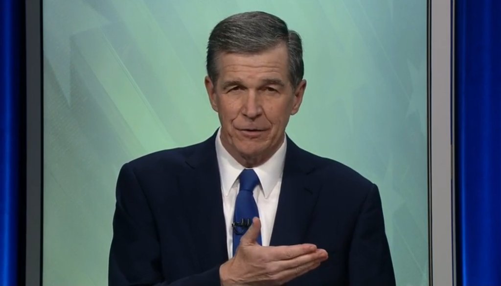 North Carolina Gov. Roy Cooper, a Democrat, talks about his opponent's position on Opportunity Scholarships during a debate on Oct. 14, 2020.