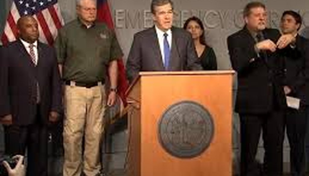 North Carolina Gov. Roy Cooper speaks at a press conference about the coronavirus outbreak.