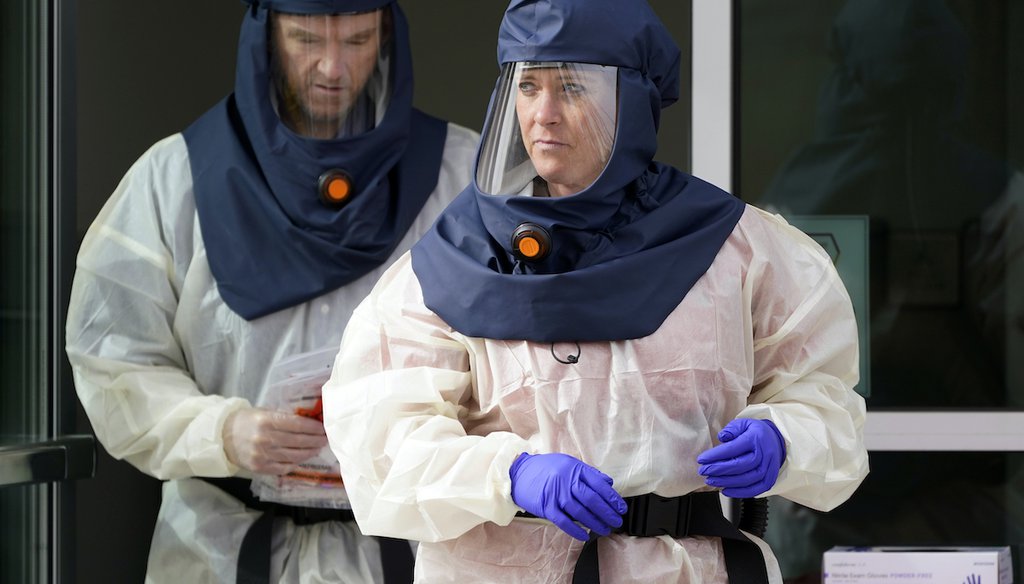 Nurses look on during coronavirus testing outside the Salt Lake County Health Department in Salt Lake City Oct. 23, 2020. Deaths per day from the coronavirus in the U.S. are on the rise again with cases climbing in nearly every single state. (AP)