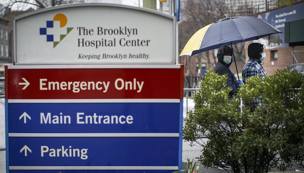 Patients wait for a COVID-19 test at Brooklyn Hospital Center in New York.  (AP Photo/John Minchillo)