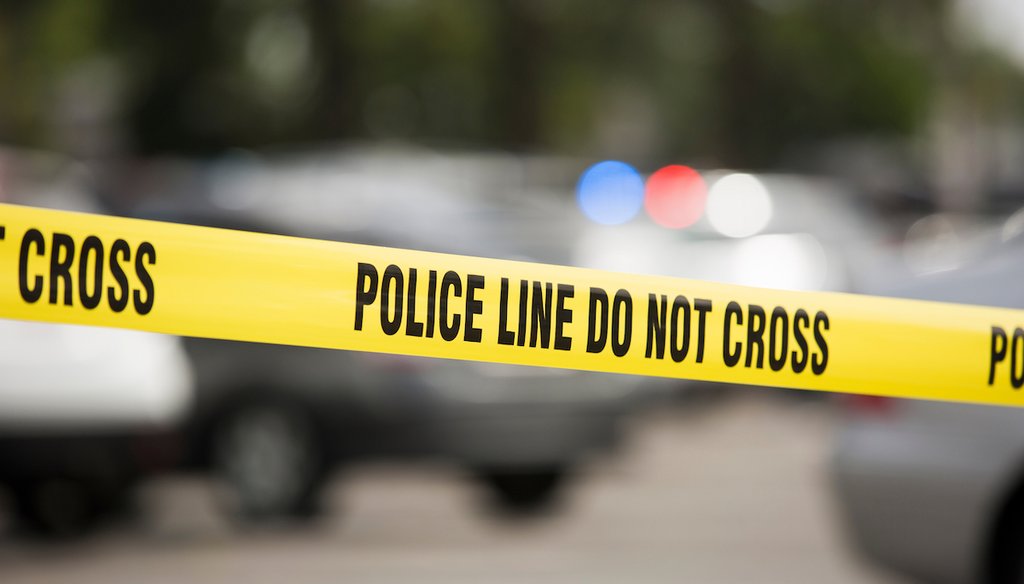 Cordon tape around an active crime scene. (Shutterstock)
