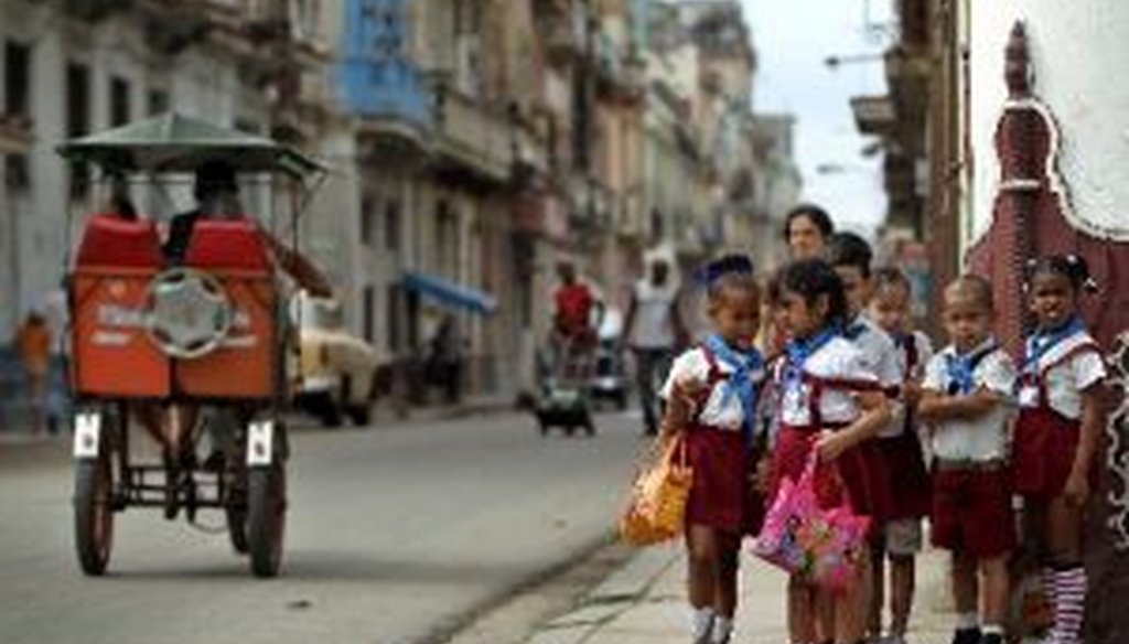 Children are seen on a corner of a street in Havana, Cuba, in January 2014. We looked at some statistical comparisons on health between Cuba and the United States.