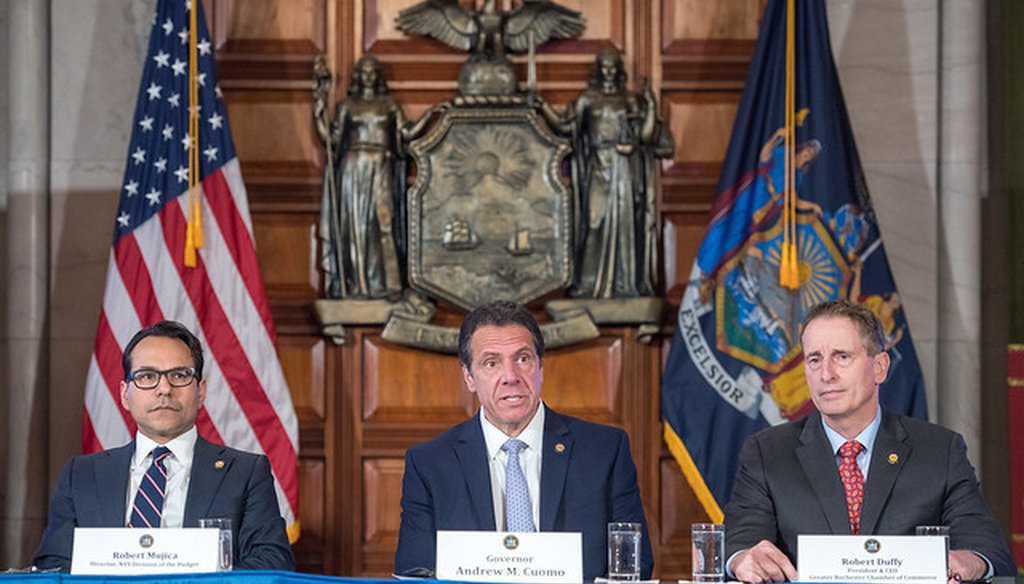 Gov. Andrew Cuomo, center, gives an update on the budget on March 11, 2019. At left is Budget Director Robert Mujica, at right is Greater Rochester Chamber of Commerce CEO Robert Duffy. (credit: flickr/governorandrewcuomo)