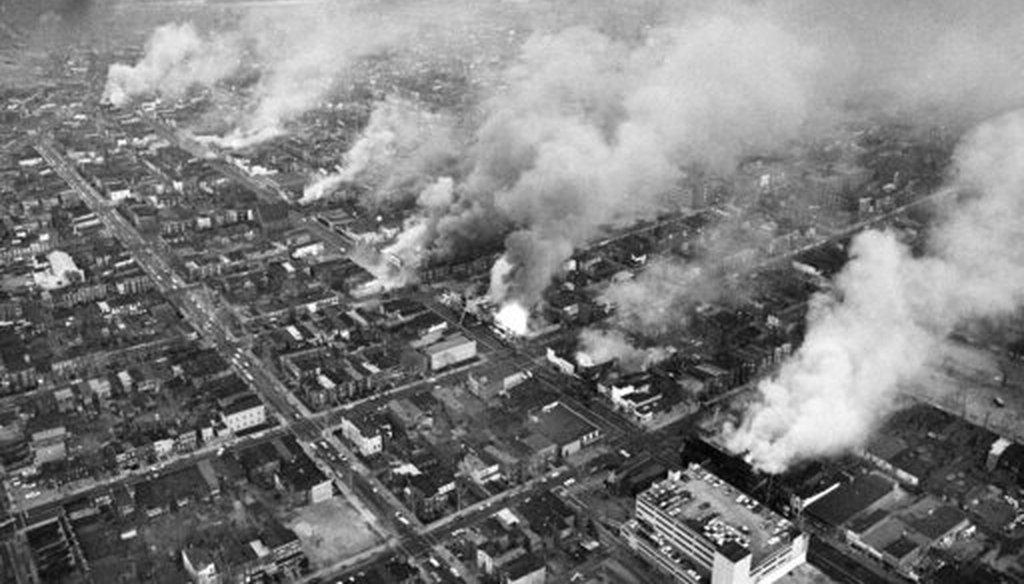 In this April 5, 1968 file photo, buildings burn along H Street in the northeast section of Washington, set afire during a day of demonstrations and rioting in reaction to the assassination of Dr. Martin Luther King Jr. (AP)
