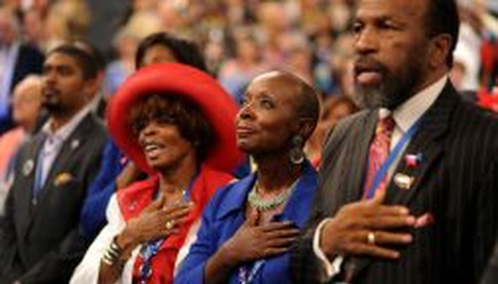 Delegates recite the Pledge of Allegiance during day two of the DNC in Charlotte on Wednesday. President Barack Obama's nomination acceptance speech has been moved indoors tonight because of the possibility of severe weather.