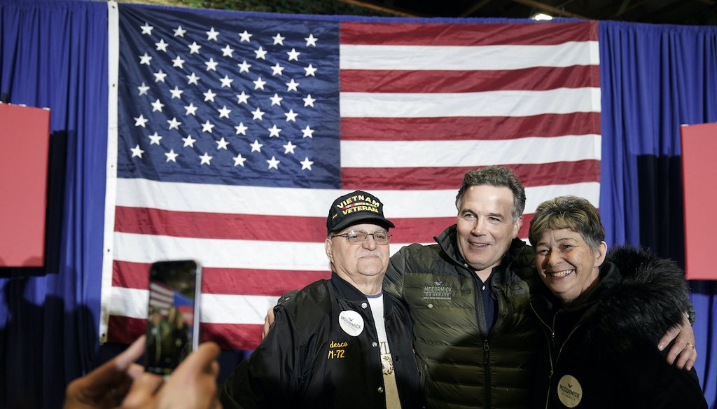 Republican U.S. Senate candidate Dave McCormick (second from right) meets with attendees during a campaign event in Coplay, Pennsylvania, on Jan. 25, 2022. (AP)