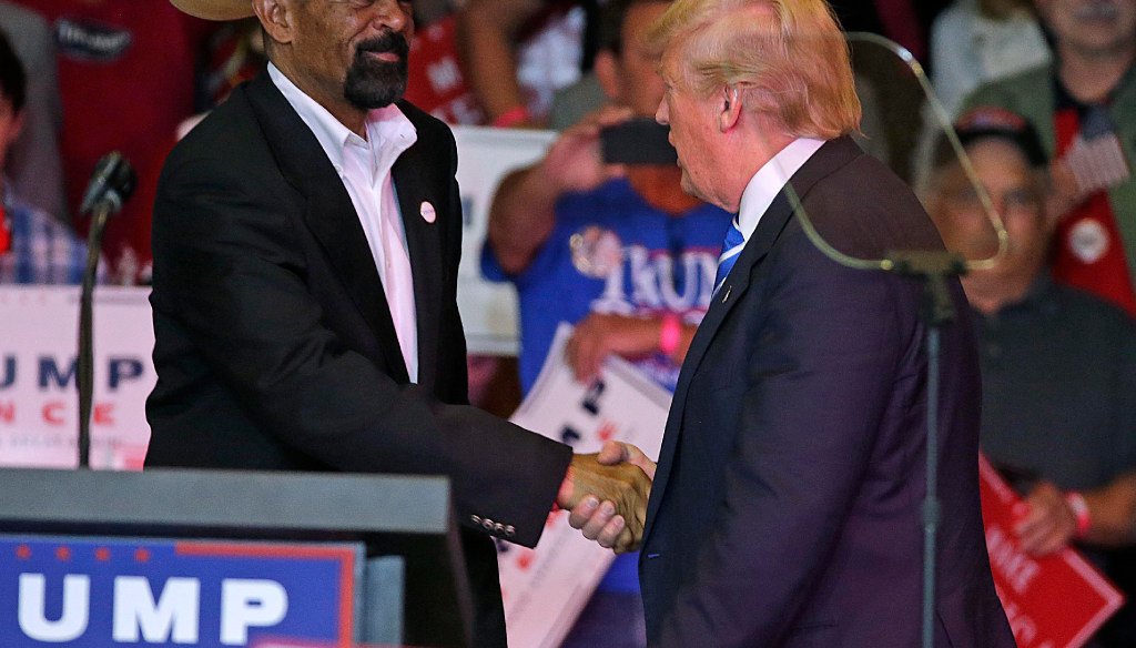 Milwaukee County Sheriff David A. Clarke Jr. (left) campaigned for Donald Trump in the 2016 presidential campaign. A plagiarism allegation has called into question whether Clarke will join Trump's administration. (Rick Wood/Milwaukee Journal Sentinel)