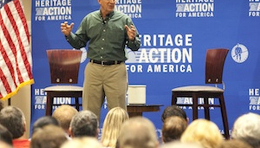 Jim DeMint speaks at the "Defund Obamacare" town hall tour in Tampa on Aug. 21, 2013. ( Eve Edelheit, Times staff)