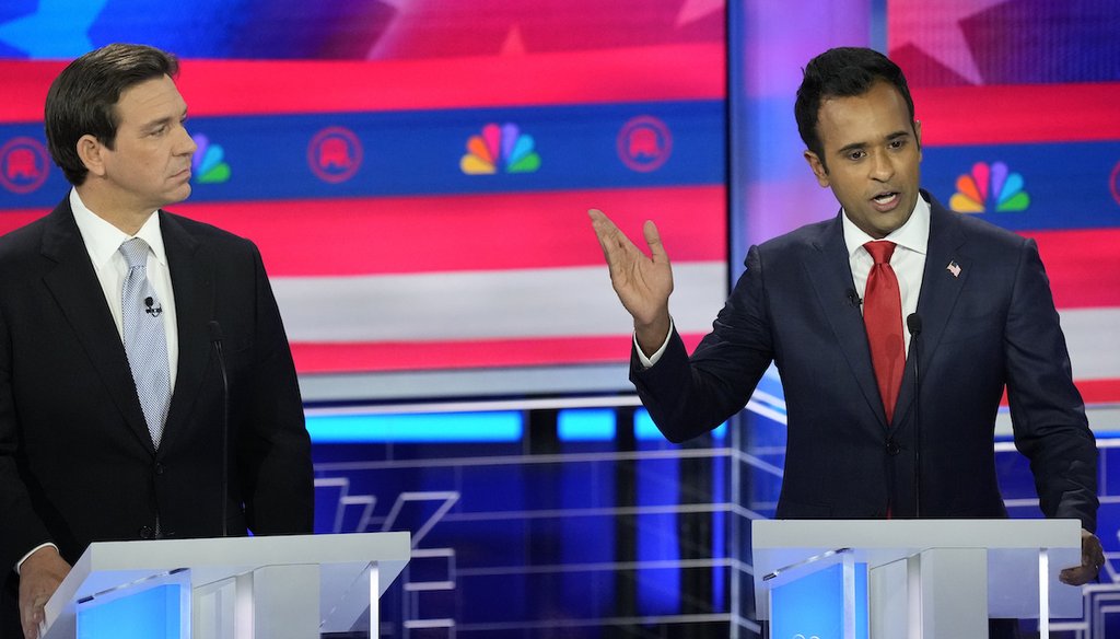Republican presidential candidate Vivek Ramaswamy speaks as Florida Gov. Ron DeSantis listens during a Republican presidential debate hosted by NBC on Nov. 8, 2023, at the Adrienne Arsht Center for the Performing Arts of Miami-Dade County. (AP)