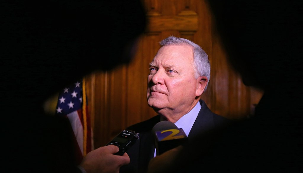 Gov.  Nathan Deal pauses outside his office to take questions from the media after his 2015 State of the State address. Photo by Curtis Compton / AJC.