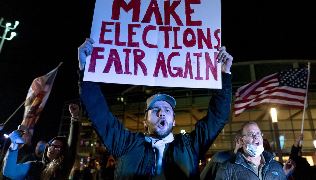 A supporter of President Donald Trump chants during a protest against the 2020 election results outside the central counting board at the former TCF Center in Detroit, Nov. 5, 2020. (AP)