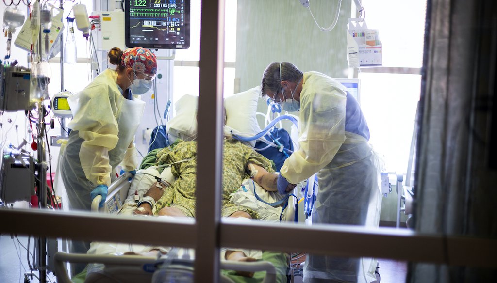In this Aug. 31, 2021 file photo, Dr. William Dittrich M.D. looks over a COVID-19 patient in the Medical Intensive care unit (MICU) at St. Luke's Boise Medical Center in Boise, Idaho. (AP)