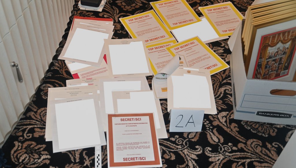 A court filing by the Justice Department in August 2022 contains this image of documents seized during the FBI's search in Donald Trump's Mar-a-Lago estate. (AP)