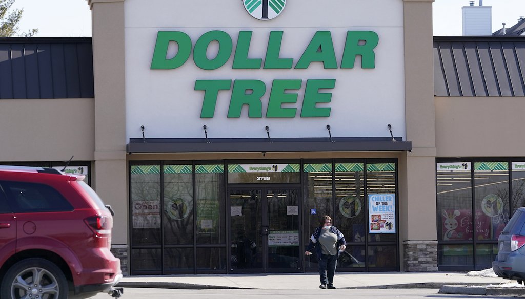 This Thursday, Feb. 25, 2021, photo shows a woman leaving a Dollar Tree store in Urbandale, Iowa. (AP)