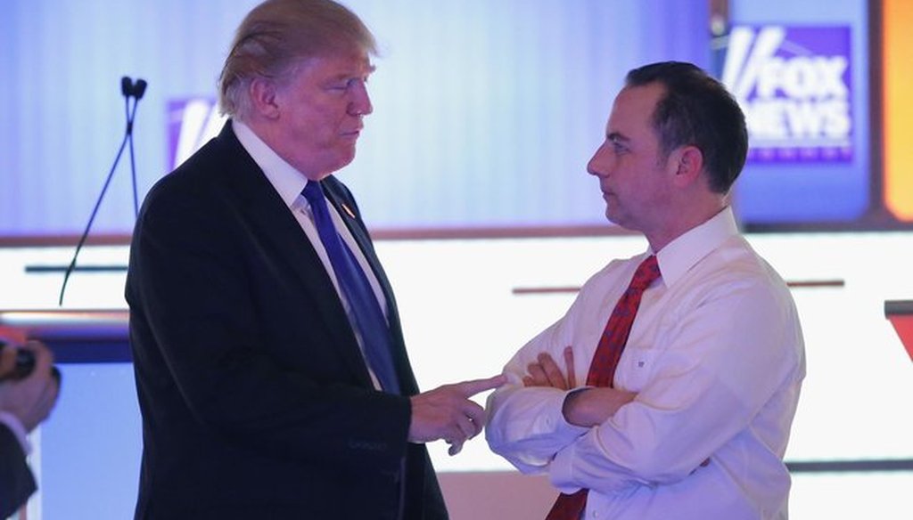 Donald Trump (left), who lost to Hillary Clinton in the popular vote, nevertheless won the presidency in "an electoral landslide," according to Reince Priebus. (Getty Images)