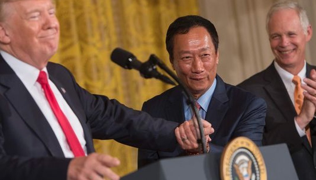President Donald Trump (from left), Foxconn chairman Terry Gou and Wisconsin U.S. Sen. Ron Johnson appeared at the White House to announce Foxconn's plans to build in Wisconsin. (Getty Images)