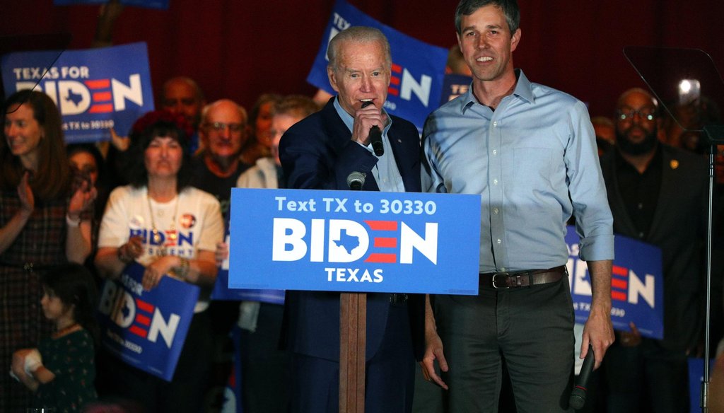Democratic presidential candidate Joe Biden speaks with Democrat Beto O'Rourke at a rally in Dallas ahead of Super Tuesday (AP Photo/Richard W. Rodriguez).