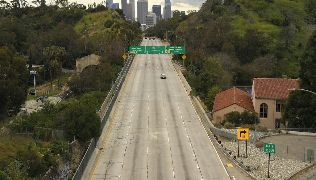 In this March 20, 2020 file photo, extremely light traffic moves along the 110 Harbor Freeway toward downtown mid afternoon, in Los Angeles. (AP)