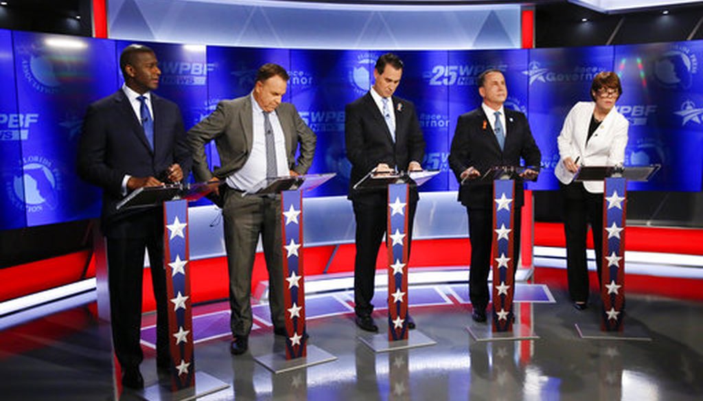 Democratic gubernatorial candidates, from left, Andrew Gillum, Jeff Greene, Chris King, Philip Levine and Gwen Graham await the start of a debate ahead of the Democratic primary for governor on Thursday, Aug. 2, 2018, in Palm Beach Gardens, Fla. (AP)