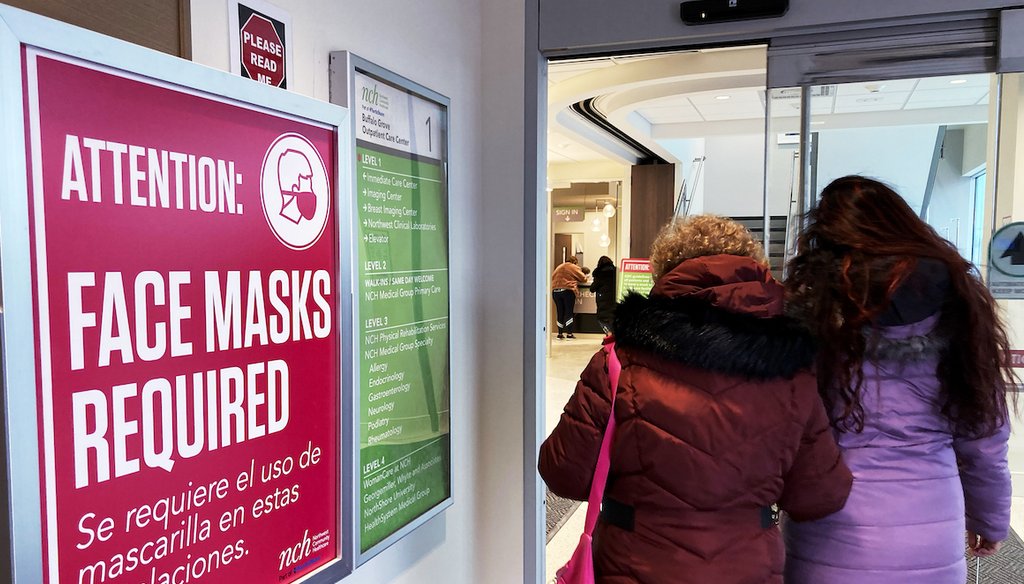 A sign announcing a face mask requirement is displayed at a hospital in Buffalo Grove, Ill., Friday, Jan. 13, 2023. COVID-19 hospital admissions are inching upward in the United States since early July 2023. (AP)