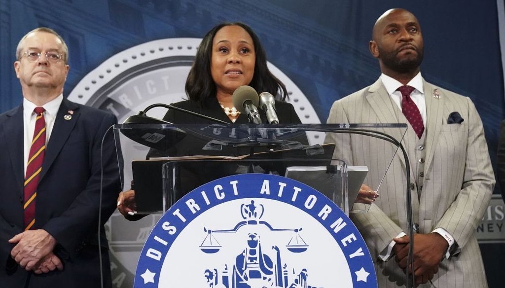 Fulton County District Attorney Fani Willis, center, speaks during a news conference on Aug. 14, 2023, in Atlanta. (AP)