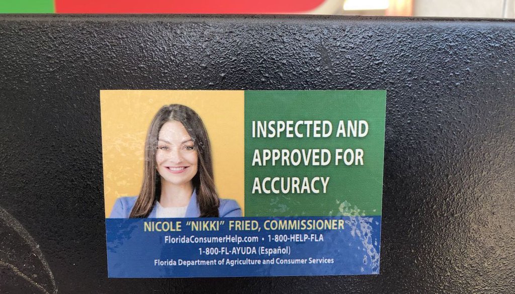 Commissioner of Agriculture Nikki Fried's office put stickers on gas pumps shortly after she took office. (Tampa Bay Times)