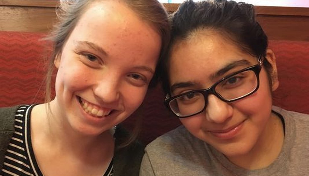 Friends Julia Craig (left) and Ravina Sachdev, high school juniors in suburban Milwaukee, agreed to disagree on a national march planned after the Florida school shooting. Sachdev participated, Craig didn't. (Annysa Johnson/Milwaukee Journal Sentinel)