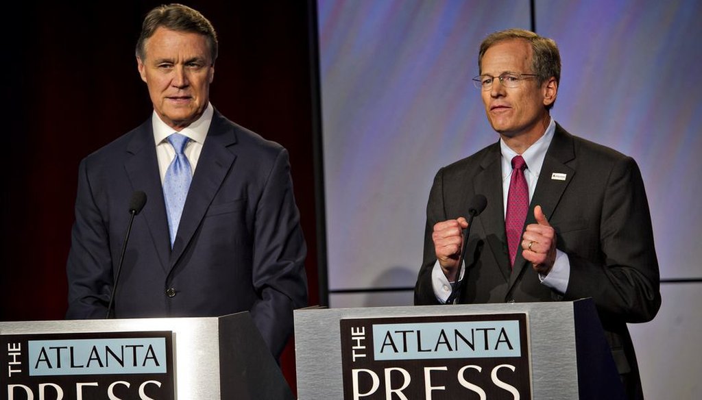 David Perdue, left, and Jack Kingston answer questions at a debate in Atlanta on July12, 2014. (Atlanta Journal-Constitution photo)
