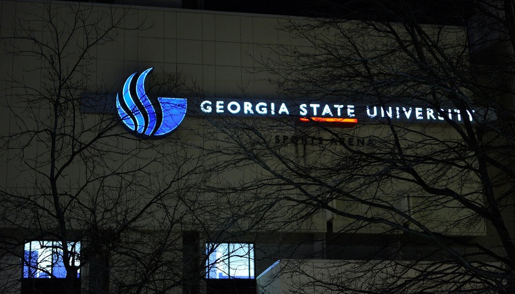 Georgia State University's downtown campus is illuminated at night after news of merger with Georgia Perimeter College. Photo by David Tulis/AJC Special
