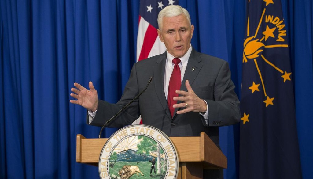 Indiana Gov. Mike Pence speaks during a press conference March 31 at the Indiana State Library in Indianapolis. (Getty)
