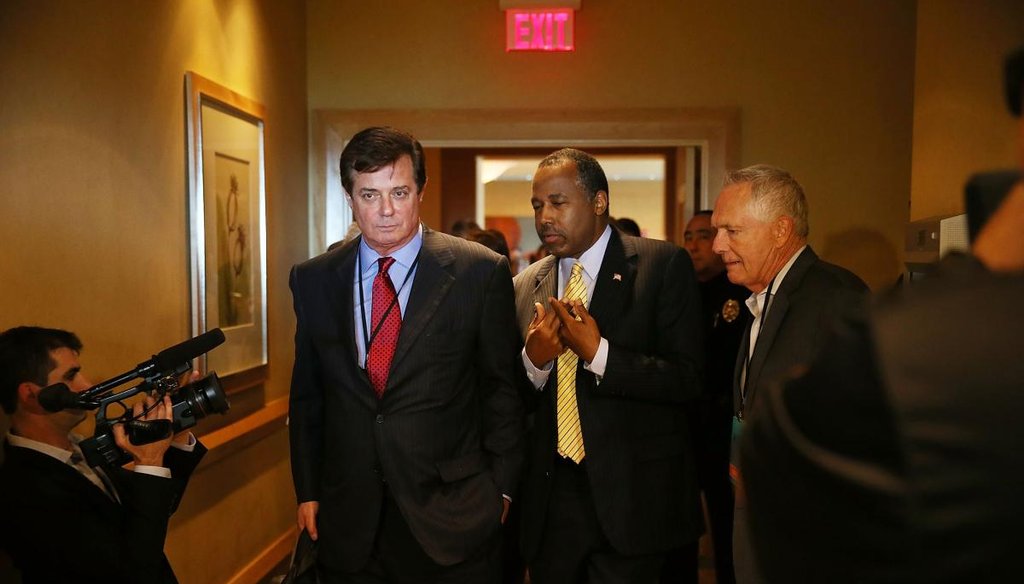 Republican presidential candidate Donald Trump's political strategist Paul Manafort (L) speaks with former Republican presidential candidate Ben Carson as they arrive for a Trump for President reception April 21, 2016. (Getty)
