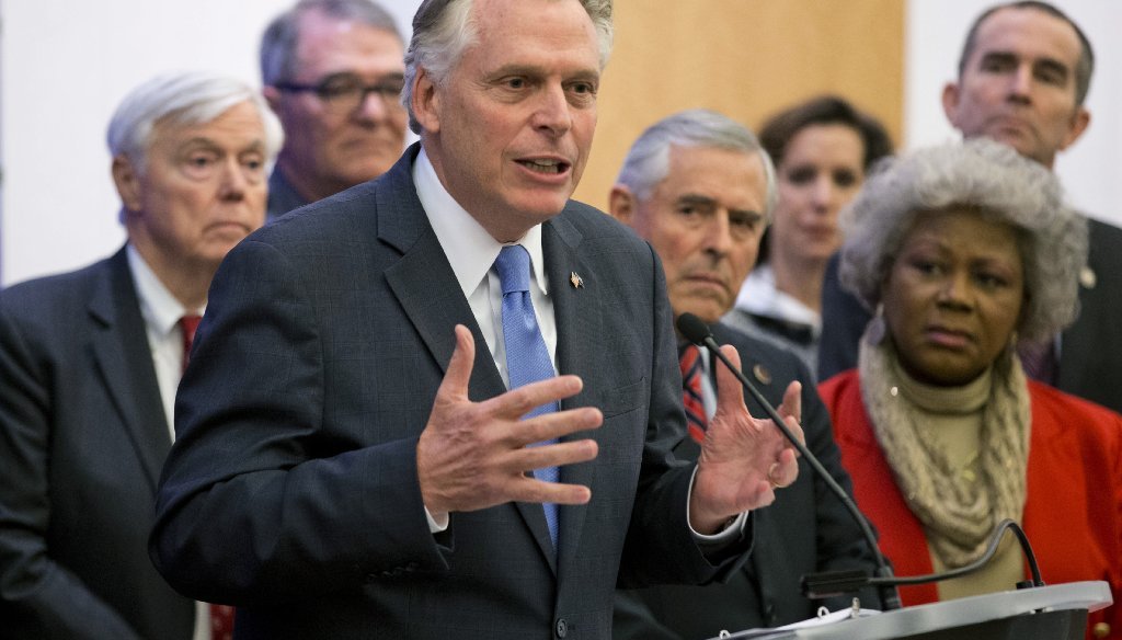 Gov. Terry McAuliffe joined lawmakers at a Jan. 29 news conference at the Capitol to announce a gun law reform package that calls for restoring recognition of concealed carry permits held by non-Virginia residents in 25 states. (Associated Press photo)
