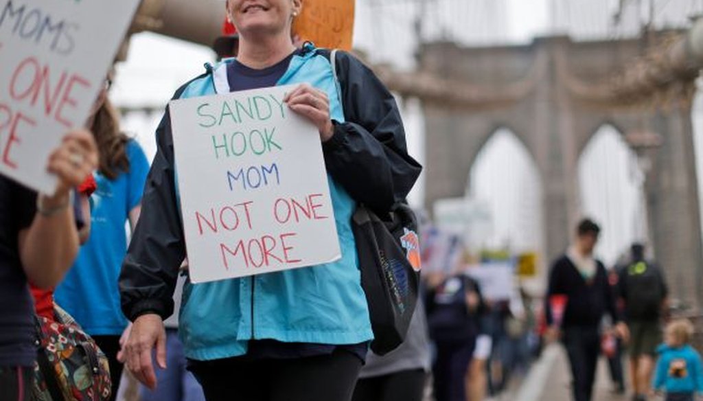 Beth Hegarty, who was inside Sandy Hook Elementary School the day of the shooting, marches over the Brooklyn bridge during the third annual Brooklyn bridge march and rally to end gun violence on May 9, 2015, in New York City. (AP/Mary Altaffer)