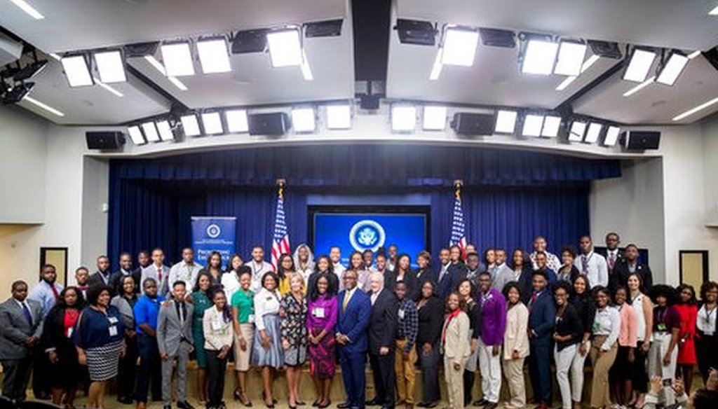 Education Secretary Betsy DeVos takes a photograph with students from historically black colleges and universities during a White House summit on Sept. 18, 2017. (AP/Andrew Harnik)
