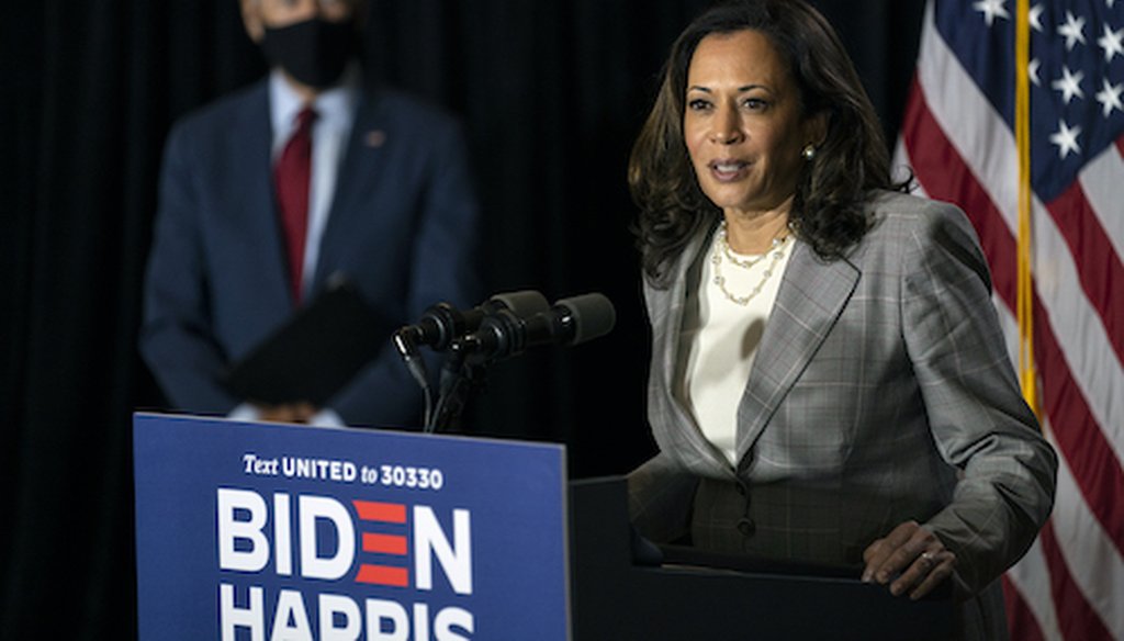 Democratic presidential candidate former Vice President Joe Biden stands left as his running mate Sen. Kamala Harris, D-Calif., speaks at the Hotel DuPont in Wilmington, Del., Thursday, Aug. 13, 2020. (AP)