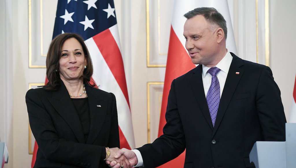 Poland's President Andrzej Duda shakes hands with Vice President Kamala Harris in Warsaw, Poland, on March 10, 2022. (AP)