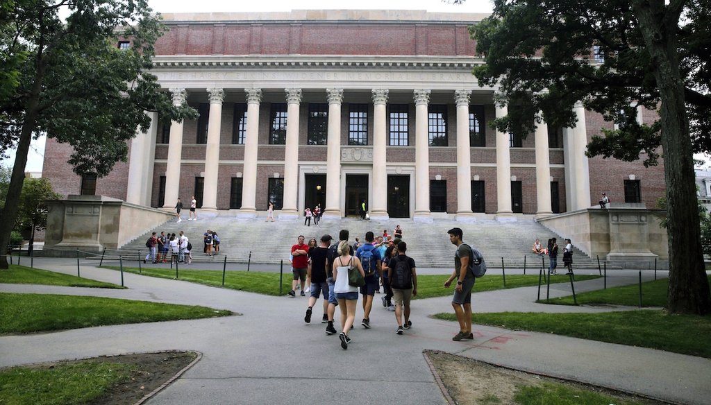 Students walk in Harvard Yard at Harvard University in Cambridge, Mass, on Aug. 13, 2019. (AP/Krupa)