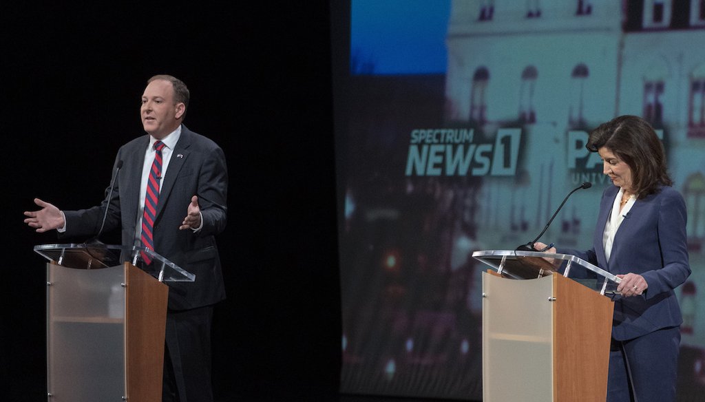 Republican candidate for New York Governor Lee Zeldin, left, participates in a debate against incumbent Democratic Gov. Kathy Hochul hosted by Spectrum News NY1, Oct. 25, 2022, at Pace University in New York. (AP)