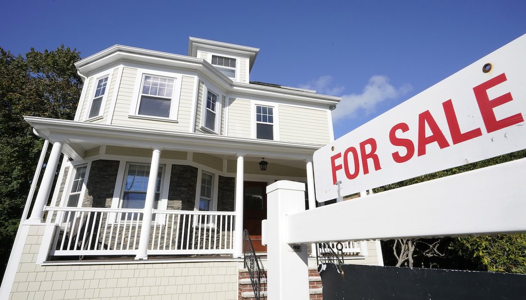 A for sale sign stands outside of a home in Westwood, Massachusetts, Oct. 6, 2020. (AP)